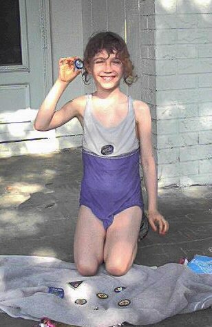 Kathryn with loads of Girl Scout stuff