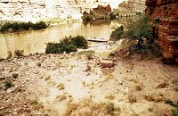 LEFT - MARBLE CANYON DAM SITE 39.8 (UPPER) CC=15. CONSTRUCTION LITTER IN CANYON.1975. NPS,  BORDEN.