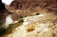 RIGHT - 74 MILE CC=40. LEDGE AND SAND CAMPSITE. 1975. NPS,  BORDEN. 
