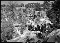 UNION PACIFIC WORK PARTY SNOWED IN ON THE N RIM WALKED TO ROARING SPRINGS & WERE MET BY A STRING OF SADDLE MULES FROM THE S RIM. TOPPING OUT S. KAIBAB TRAIL. 22 FEB 1937 NPS PHOTO.<br><br>