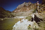 LOOKING OUT THE MOUTH OF THE LITTLE COLORADO, CHUAR BUTTE ON THE HORIZON. AUG 1963. NPS, BELKNAP C-12