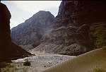 LOOKING UP THE GRAND CANYON FROM THE MOUTH OF KANAB CREEK. KANAB CREEK ENTERS THE PICTURE AT LEFT. 22 AUG 1963. NPS, BELKNAP 89