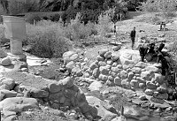 CCC ENROLLEES CONSTRUCTING COBBLE ABUTMENT FOR BRIDGE OVER BRIGHT ANGEL CREEK. 26 MAR 1936 NPS PHOTO