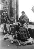 FRED HARVEY / SANTA FE PROMOTIONAL PHOTO: &quotHOPI INDIAN FAMILY WEAVING AT THE DESERT WATCHTOWER" CIRCA 1933. FRED HARVEY CO. 