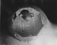 FRED KABOTIE, HOPI ARTIST, WORKING ON SANDPAINTING IN DESERT VIEW WATCHTOWER. CIRCA 1932. FRED HARVEY CO. GRCA 15948