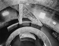 VIEW DOWN FROM SECOND GALLERY PARAPET, INTERIOR OF WATCHTOWER. CIRCA 1932. FRED HARVEY CO. GRCA 22676.
