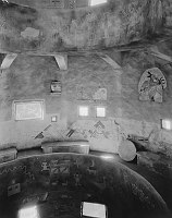 INTERIOR OF THE WATCHTOWER, A BALCONY COVERED WITH PETROGLYPHS AND PICTOGRAPHS. CIRCA 1932. FRED HARVEY CO. 