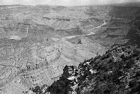 WATCHTOWER CONSTRUCTION. VIEW DOWN INTO CANYON TOWARDS RIVER FROM TOWER FRAME. DESERT VIEW POINT. CIRCA 1931. COLTER.
