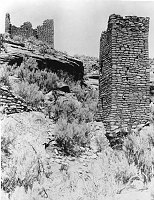 MARY COLTER USED THIS STRUCTURE AS A MODEL FOR DESERT VIEW WATCHTOWER. SQUARE TOWER RUIN, HOVENWEEP N.M. GRCA 18640B CIRCA 1931. FRED HARVEY CO. 