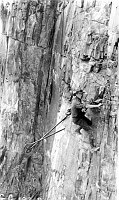 ENGINEER JOHN C. LAWRENCE PLACING CABLE ANCHORAGE FOR KAIBAB SUSPENSION BRIDGE. 1928 NPS.