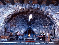 THE GREAT FIREPLACE AT HERMITS REST (1914) BY THE SANTA FE RAILROAD. DESIGNED BY MARY COLTER. NPS PHOTO. 