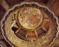 LOOKING UP THROUGH THE FIRST AND SECOND PARAPETS OF MARY COLTER'S DESERT VIEW WATCHTOWER (1932) TO THE CEILING PAINTED BY HOPI ARTIST, FRED KABOTIE. GRAND CANYON N.P. NPS PHOTO.