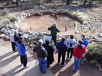 RANGER TALK AT THE TUSAYAN MUSEUM. VISITORS LEARN ABOUT THE EARLY PEOPLE WHO MADE GRAND CANYON THEIR HOME 800 YEARS AGO. NPS PHOTO. 