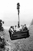 PIPELINE TRAM GONDOLA FULL TO CAPACITY WITH 10 PEOPLE. NEARING INDIAN GARDENS. CIRCA 1931. LAUZON, NPS.