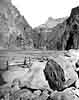 #17253 - REPAIRING BOATS IN THE GRANITE GORGE, GRAND CANYON, DURING THE SECOND POWELL EXPEDITION. AUGUST 1872