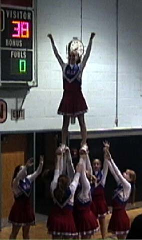 Seals wrestling cheerleaders  doing a stunt