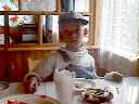 Daniil at table at the veranda