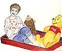 My son in his new wagon, with his old buddies Pooh and Gingerbear