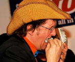 Texan Billionaire Grazes the Dollars - photo by Diane Lent