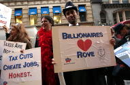 Billionaires for Bush (and Rove) greet Mavericks
-Photo by Fred Askew