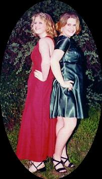 Michelle and Andrea showing off their prom dresses