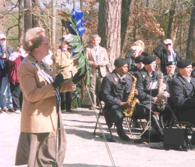 Georgia State Regent, Rose Elyea Bell places wreath. In the background, James R. Cook,
SCSSAR State President.