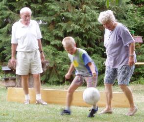 [playing soccer]