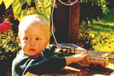 [Dani plays with tractor]