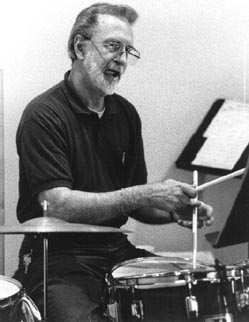 Photo of Richard at the drums in Yachats during  practice October 2001