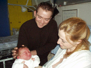 Amalie together with mom and daddy !