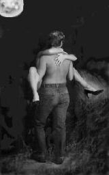 Drawing of man holding a woman in the moonlight