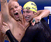 Thorpe (right) with Micheal Klim after the 4 x 100 m relay