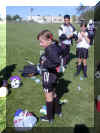 Heather putting on her goalie jersey