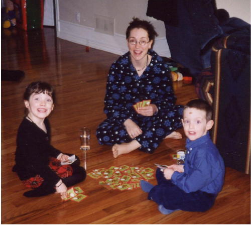 Me, Genevi�ve and Patrick playing cards at Christmas, 2003