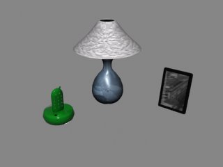 A lamp, phone and picture frame