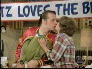 Lenny steals a kiss