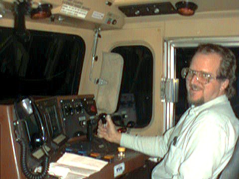 Stan at the controls of a 4,400 Horsepower Diesel Electric Locomotive