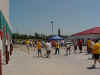 crowd on side of building.jpg (51077 bytes)