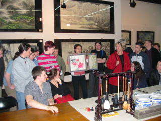 Students and teachers at an art gallery in Xian