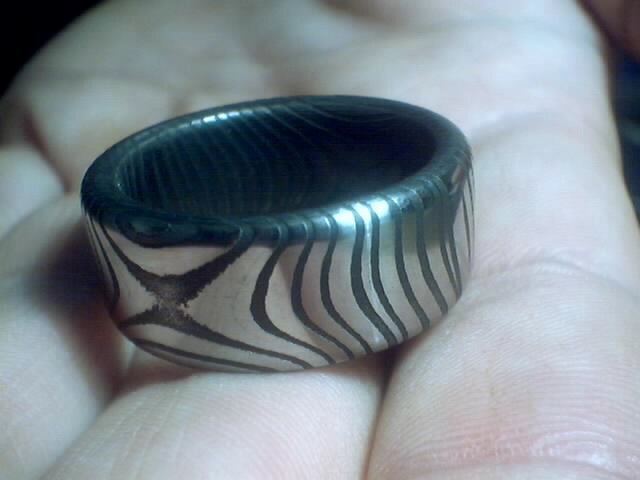 Click to see more rings and knives made from damascus steel!