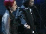 [Singing with Pavarotti]