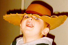 Fletcher in a Toy Story fedora.