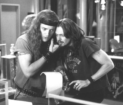 Chazz and Rex ( I didn't have a good Adam Sandler picture to show you, which is why the link below doesn't seem to correspond with this image. Adam Sandler IS in the movie) conspire.