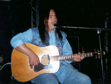 TC playing guitar