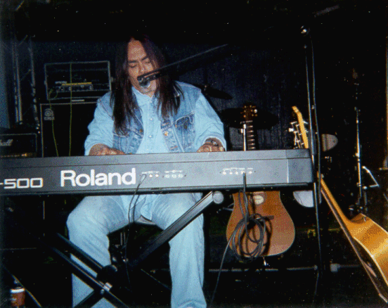 TC playing keyboard.