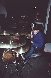 Chris dando uma de baterista