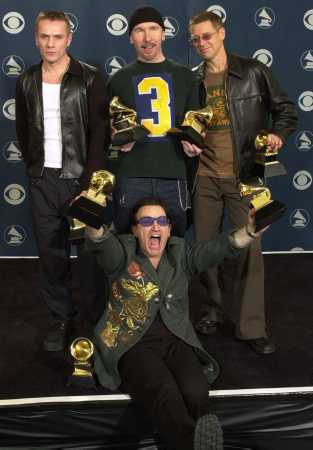 THE BAND POSED FOR THE PRESS.