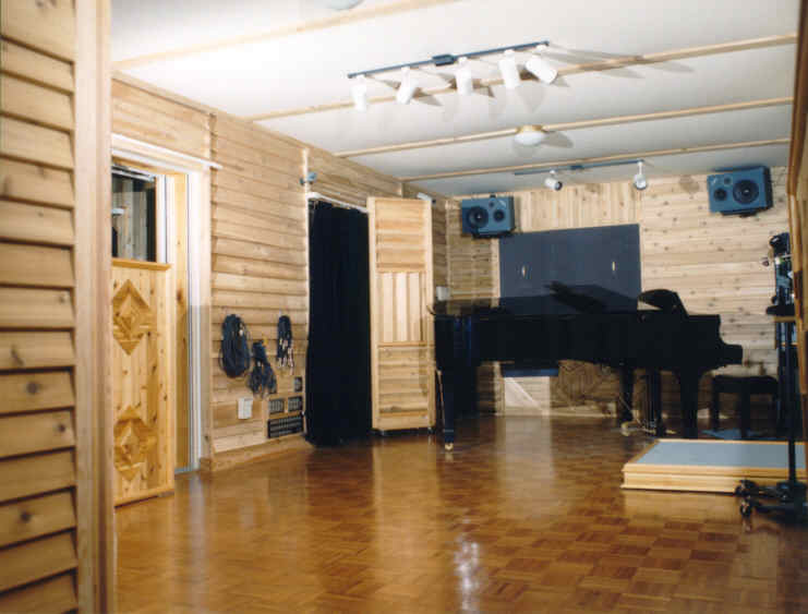 A shot of the lower main studio.  Drum and Solo Room doors to left and wall on far left is to a movable vocal booth - cool!