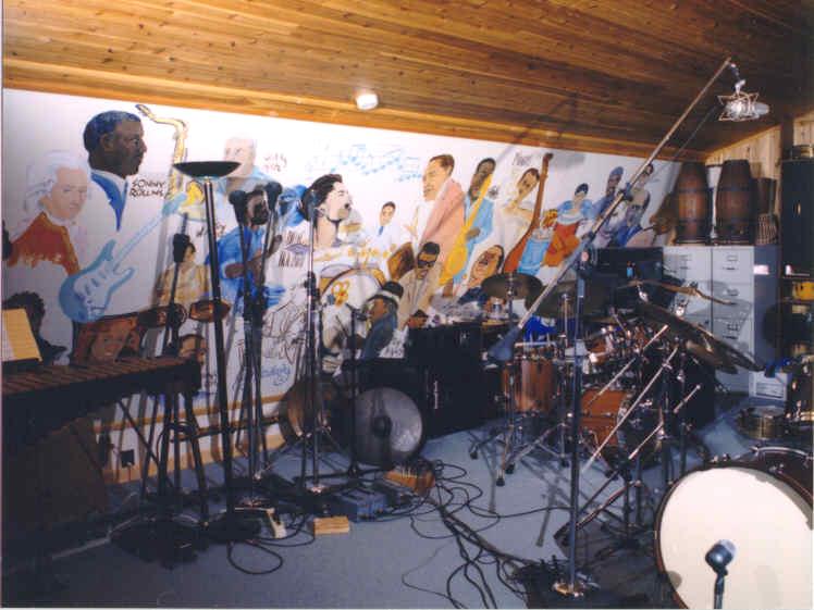 A friend of Rick's painted the murals on each side wall in the upper main studio