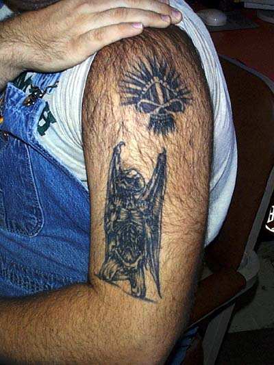 MILKMAN's left arm.